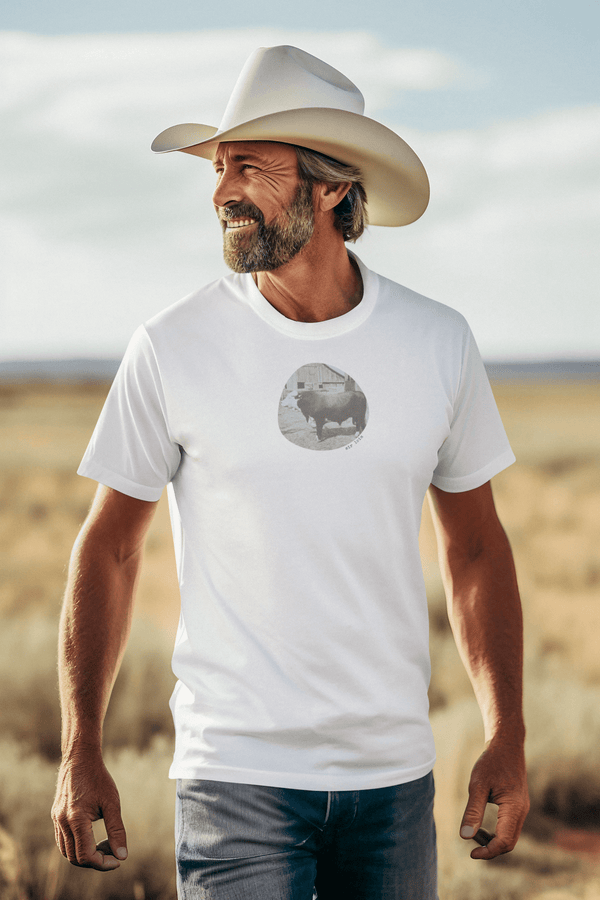 man wearing white tshirt with vintage photo print of bull and the text sir loin